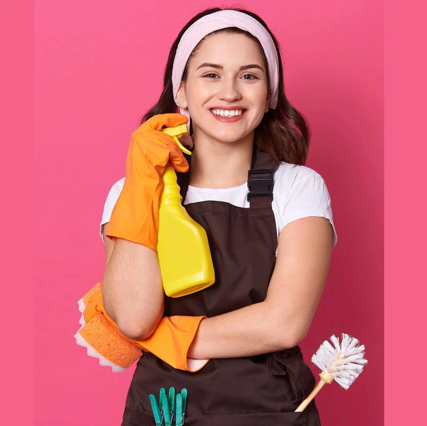 A man in a wheelchair is being pushed by a woman in a pink shirt.